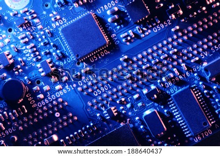 blue printed circuit board top view with red lighting