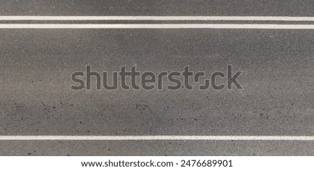 Similar – Image, Stock Photo Old gray asphalt of a road on the dike at the harbor of Norddeich during rain at the North Sea in East Frisia near Norden in Lower Saxony, Germany