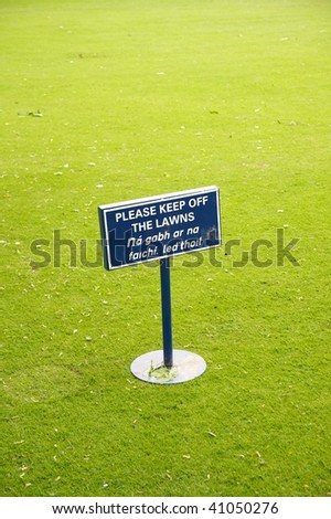 keep off the lawns blue sign at a park of dublin