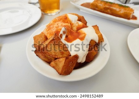 Image, Stock Photo Patatas bravas traditional Spanish potatoes snack tapas