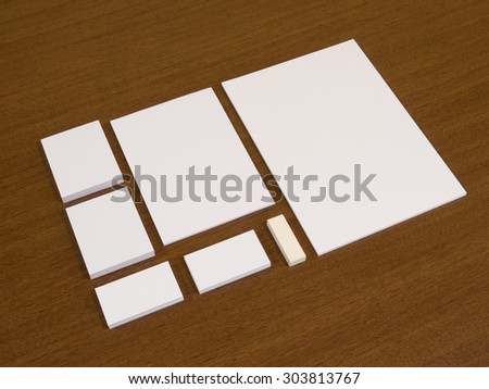 Empty set of corporate identity templates. Stationery with business cards, blocks of papers and eraser.