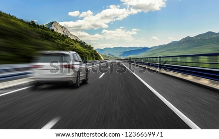 Similar – Image, Stock Photo blurred photo with car at traffic light and star bokeh