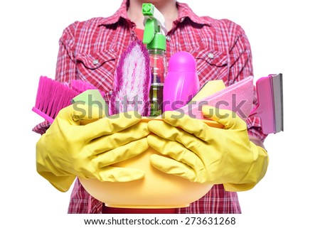 Cleaning lady holding basin with cleaning supplies, against white background.