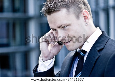 Closeup Photo Of A Corporate Man On The Phone