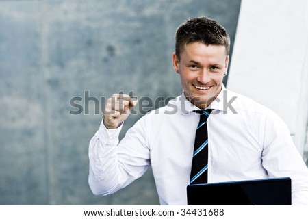 Closeup Of A Corporate Successful Man With Laptop