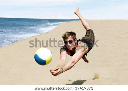 Photo Of A Young Man In A Dynamic Jump Hitting A Volley Ball