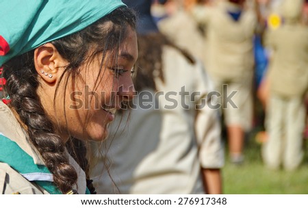 TEL AVIV - MAY 9, 2015: Unidentified Israel girl Scouts youth leader aged 16-17 celebrating in a yearly graduation passage ceremony in a Tel Aviv suburb