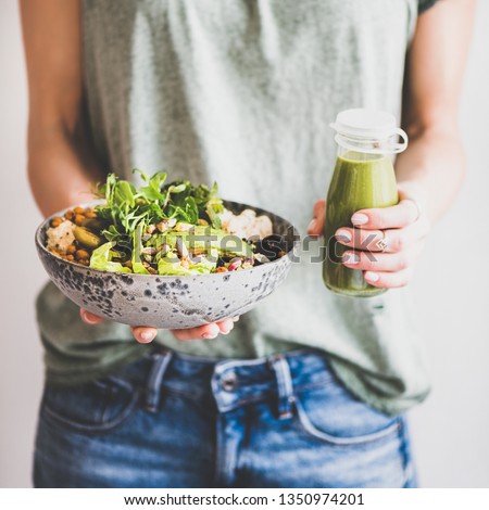 Similar – Image, Stock Photo Hand holding a cauliflower against a neutral background. Healthy food.