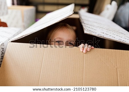 Similar – Image, Stock Photo Little Caucasian Girl in costume of which orange and black color and celebrating Halloween outdoor