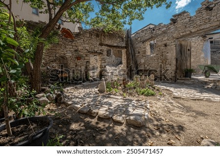 Similar – Image, Stock Photo Stone house located on rocky mountain in winter time at sunset