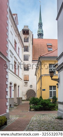 Skarnu (Butcher\'s) street, Old City of Riga, Latvia-October 2, 2015: One of the most beautiful streets in old city town - St.Peter\'s & St. George\'s churches, the oldest stone building & Konventa Seta