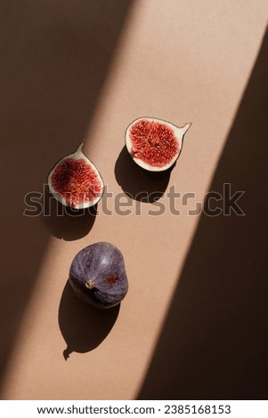 Similar – Image, Stock Photo Fresh figs in a rustic bowl on a beige linen tablecloth.