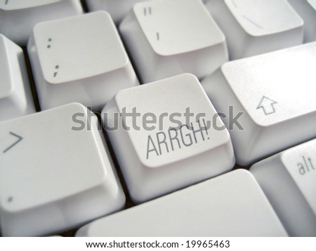 Close up of a white keyboard with the word \