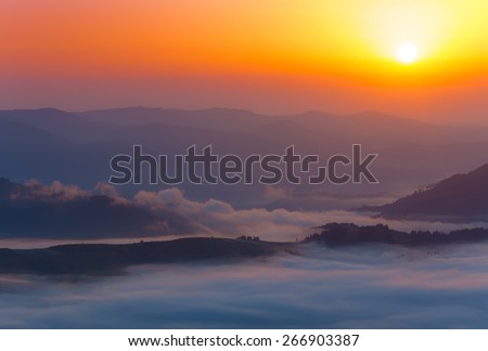 Beautiful mountain landscape, cloudy sunset.