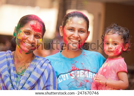 Women celebrating Indian color festival called HOLI on March 17, 2014, Mumbai Maharashtra India South East Asia