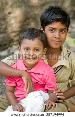 MAHARASHTRA, INDIA SEPTEMBER 22, 2011: Indian rural boys lifestyle, SEPTEMBER 22, 2011, rural village, Salunkwadi, Ambajogai, Beed, Maharashtra, India
