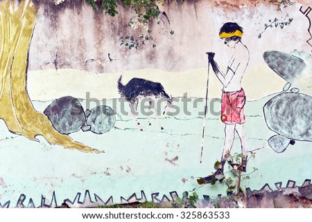 MAHARASHTRA, INDIA January 20, 2012: goat keeper boy wall painting by students, January 20, 2012, Govt. School of Art, Aurangabad, Maharashtra, India, Southeast Asia.