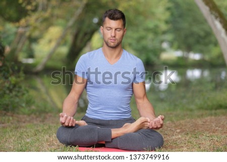 Similar – Image, Stock Photo Shirtless man doing yoga on terrace