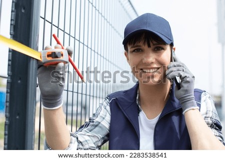 Similar – Image, Stock Photo Woman on fence in mountainous area