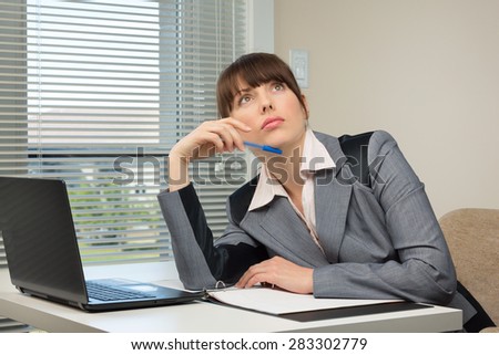 The image of business woman in an office