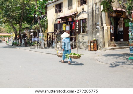 Hoi An, Vietnam - March 14: Life of vietnamese vendor in HANOI, VIETNAM on March 14, 2014