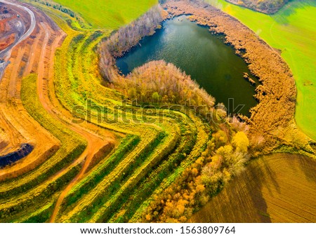 Aerial view of recultivated  landscape after mining. Dump from old underground mine. Climate change concept. Back to nature. Western Bohemia, Czech Republic, European Union. Imagine de stoc © 
