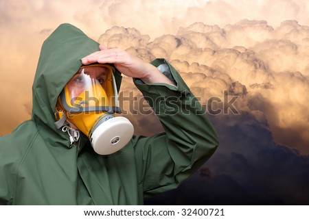 Woman in gas mask on smoke background