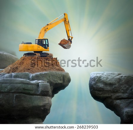 Excavator digging big hole.