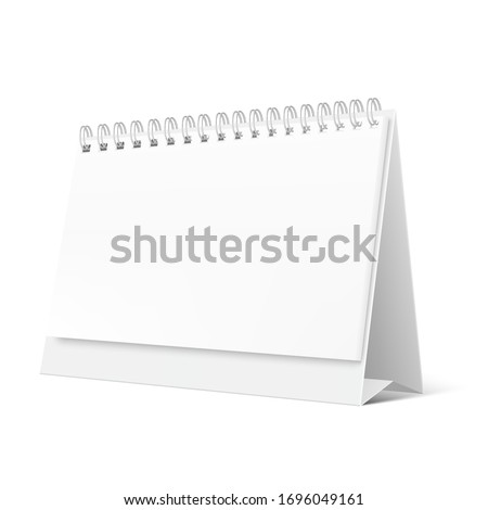 Blank desktop calendar isolated on white background. Blank desktop spiral calendar. Realistic white blank standing desk calendar with a spiral