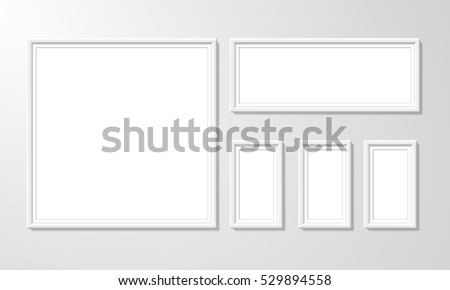blank picture frame template set isolated on wall. Set of white photo frames. Vector realistic white picture frame composition. Modern design element for you product mock-up or presentation.