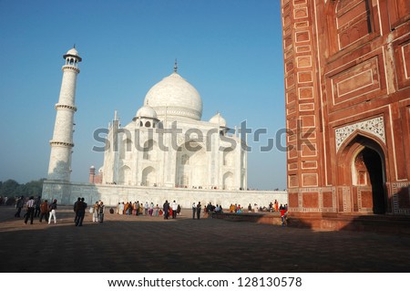 AGRA, INDIA - NOVEMBER 18:unidentified  tourists visiting famous landmark of India - Taj Mahal monument listed as UNESCO World Heritage Site on November 18,2012 in Agra,Uttar Pradesh, India