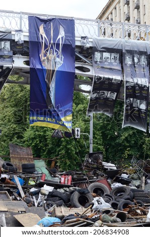 KIEV, UKRAINE - JUNE 19: Barricades with bridge and poster displaying symbol of \