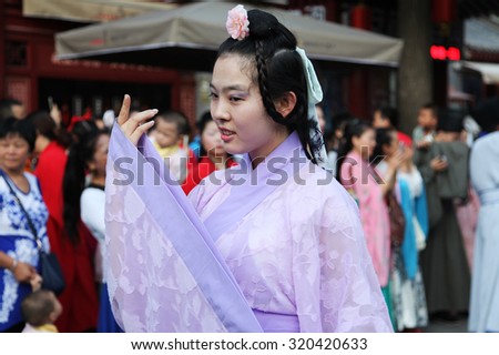 On August, 2015, 20, xian, China, wearing hanfu Oriental woman in the worship of the legendary vega, attracting tourists. The day is valentine's day in ancient China: Chinese valentine's day.