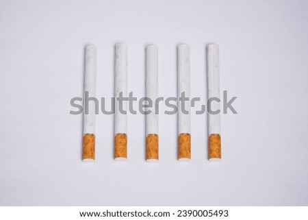 Similar – Image, Stock Photo Filter cigarette lies on a wooden table