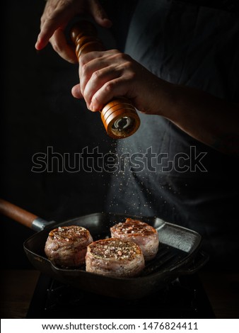 Similar – Image, Stock Photo Grill pan with rosemary and garlic in kitchen