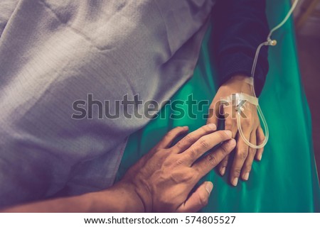 Similar – Man holding an elderly woman’s hand