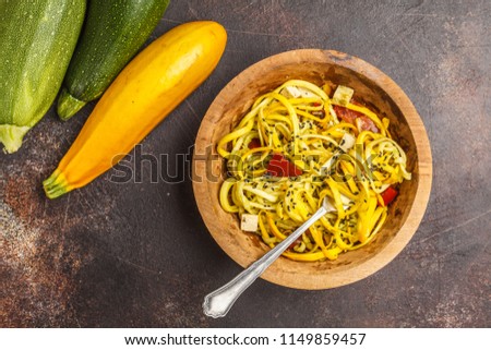 Similar – Image, Stock Photo Zucchini raw vegan pasta with assorted vegetables. Vegan food