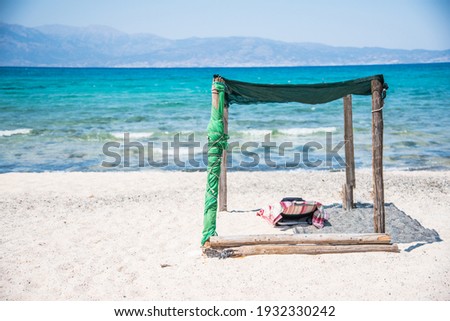 A bed under the shade on the Chrissi island, near Crete in Greece