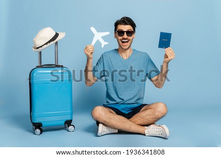 Similar – Image, Stock Photo Travel Concept man hand hold Compass on the road in the outback. Point of view shot