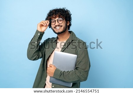 Similar – Image, Stock Photo Arabian man in blue clothes walking on a desert dune.