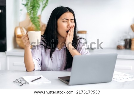 Similar – Image, Stock Photo Asian woman with coffee talking smartphone at cafe table