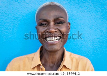 Image, Stock Photo Cool black woman with Afro braids on street in sunshine