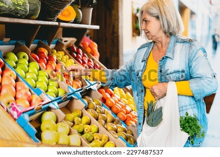 Similar – Image, Stock Photo Woman shopping on vegetable market