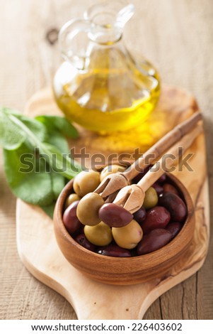 black and green marinated olives oil sage leaf
