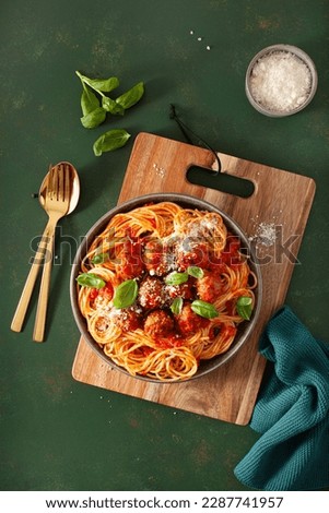 Similar – Image, Stock Photo Spaghetti and the sauce ingredients, top view. Uncooked pasta isolated brown colored table.