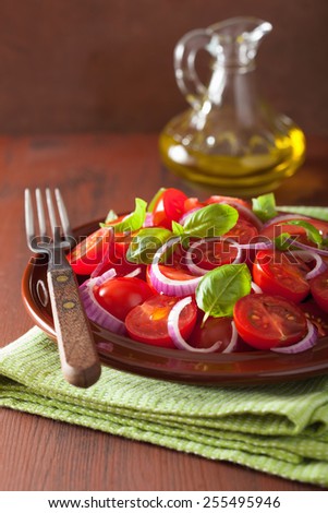 healthy tomato salad with onion basil olive oil and balsamic vinegar