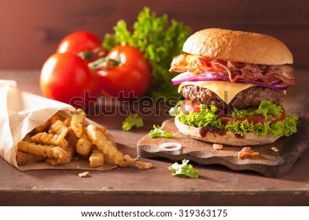 bacon cheese hamburger with beef patty tomato onion