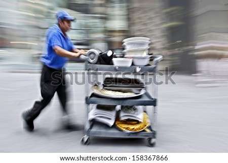 lunchtime, delivery food and drink with dolly by hand, purposely motion blur
