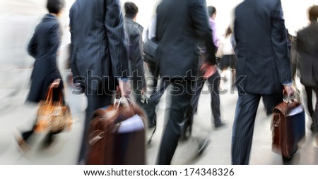 abstrakt image of business people in the street and modern style with a blurred background