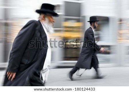 abstrakt image of Jewish business people in the street and modern style with a blurred background